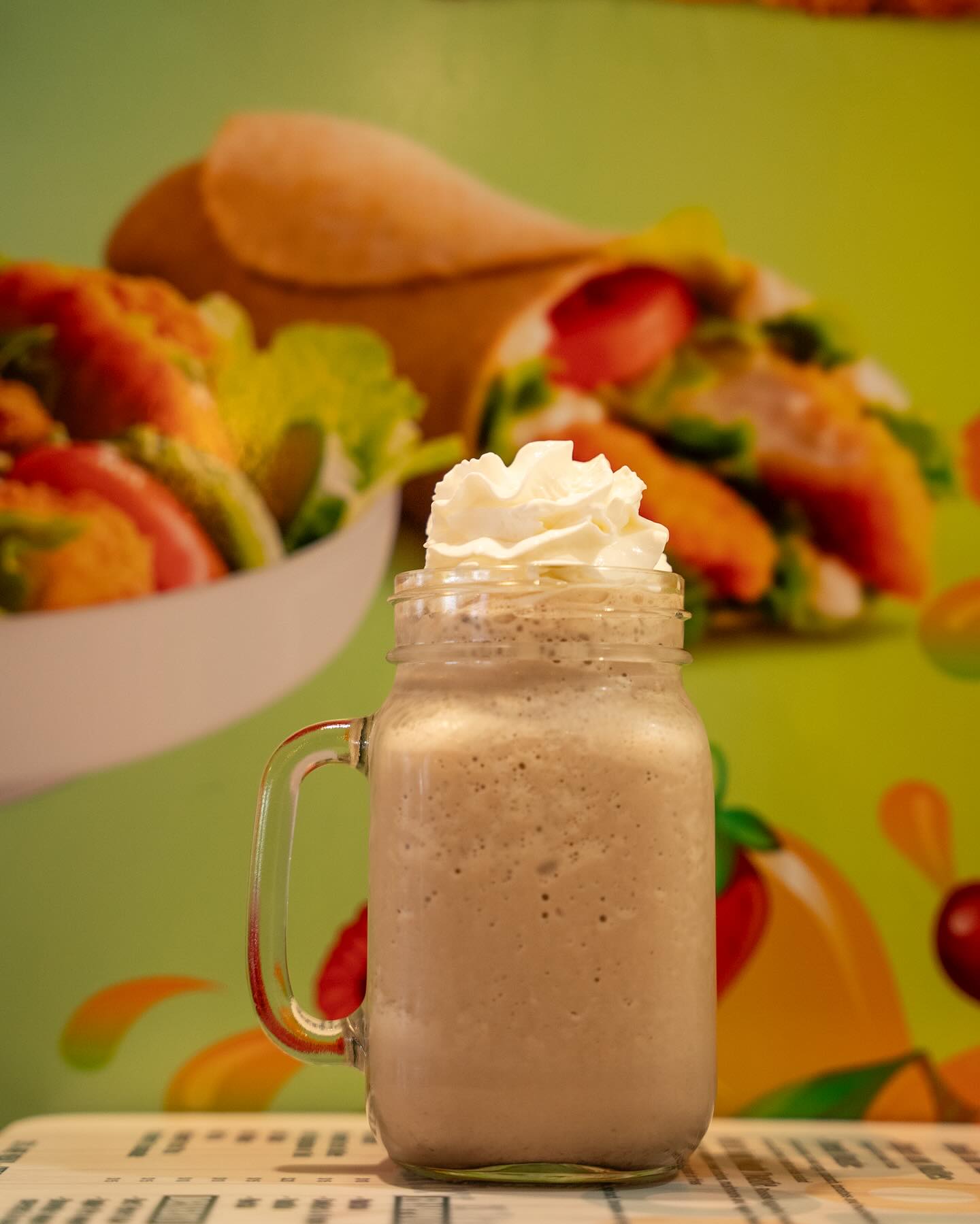 Creamy blended smoothie in a mason jar
